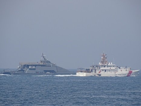 Oil tankers crossing the Strait of Hormuz during the Iran-US conflict